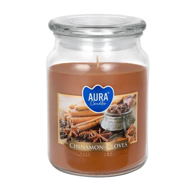 Duża świeca Cynamon - Goździki w szkle z wieczkiem snd99-374 Aura w eleganckim transparentnym słoju. Aromatyczna świeca zapachowa doskonale tworzy przytulny klimat i wypełnia wnętrze korzennym aromatem cynamonu i goździków.